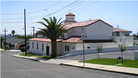 Church with Parish Hall on left (beyond stop sign)
